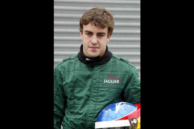 Renault test driver Fernando Alonso tries the Jaguar R3. 2002 Formula One Testing, Silverstone, England. 30th May 2002.