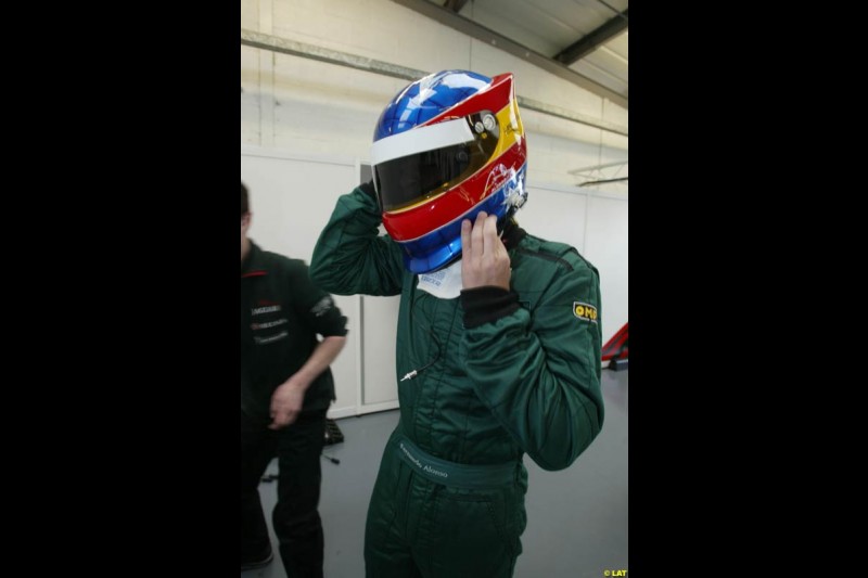 Renault test driver Fernando Alonso tries the Jaguar R3. 2002 Formula One Testing, Silverstone, England. 30th May 2002.
