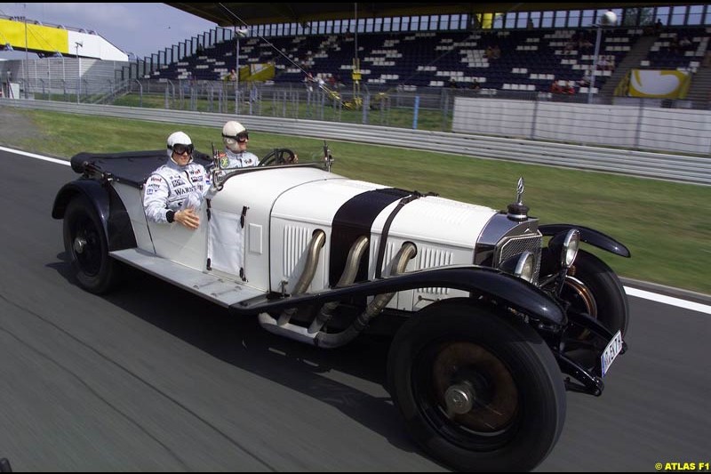 On 19 June 1927, 75 years ago, Rudolf Caracciola won the inaugurating race at the Nurburgring with a Mercedes S. On the occasion of that anniversary, West McLaren Mercedes drivers David Coulthard and Kimi Raikkonen drove Caracciola's car around the Grand Prix track. Earlier that day, David and Kimi unveiled a Juan Manuel Fangio statue in front of the Nurburgring Erlebniswelt.