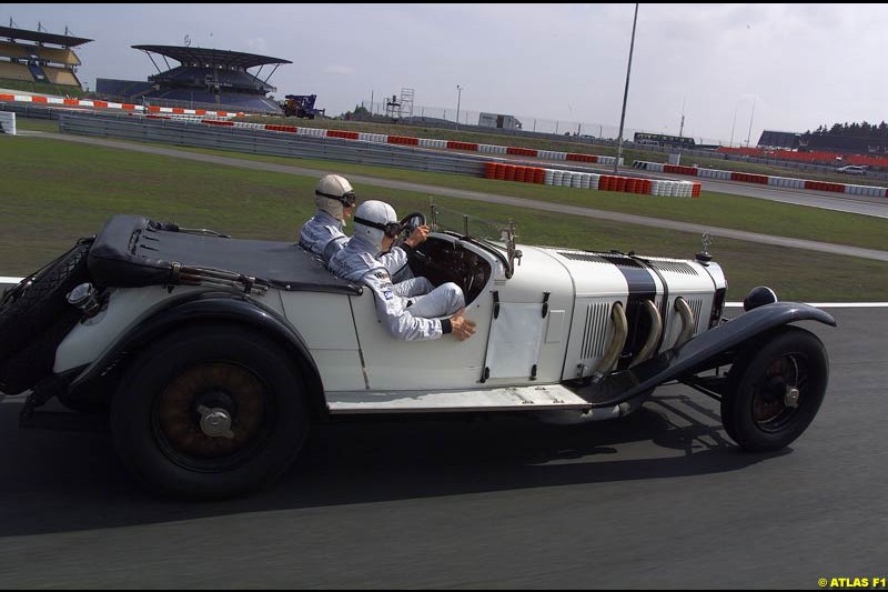 On 19 June 1927, 75 years ago, Rudolf Caracciola won the inaugurating race at the Nurburgring with a Mercedes S. On the occasion of that anniversary, West McLaren Mercedes drivers David Coulthard and Kimi Raikkonen drove Caracciola's car around the Grand Prix track. Earlier that day, David and Kimi unveiled a Juan Manuel Fangio statue in front of the Nurburgring Erlebniswelt.