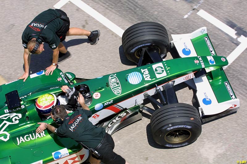 Mark Webber (AUS) tests the Jaguar R3. Formula One Testing, Barcelona, Spain, 2June 8 2002.