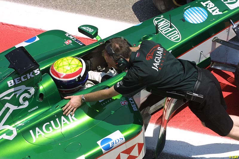 Mark Webber (AUS) tests the Jaguar R3. Formula One Testing, Barcelona, Spain, 2June 8 2002.