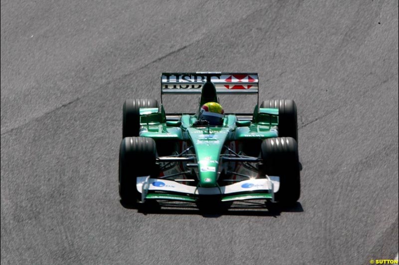 Mark Webber (AUS) tests the Jaguar R3. Formula One Testing, Barcelona, Spain, 2June 8 2002.
