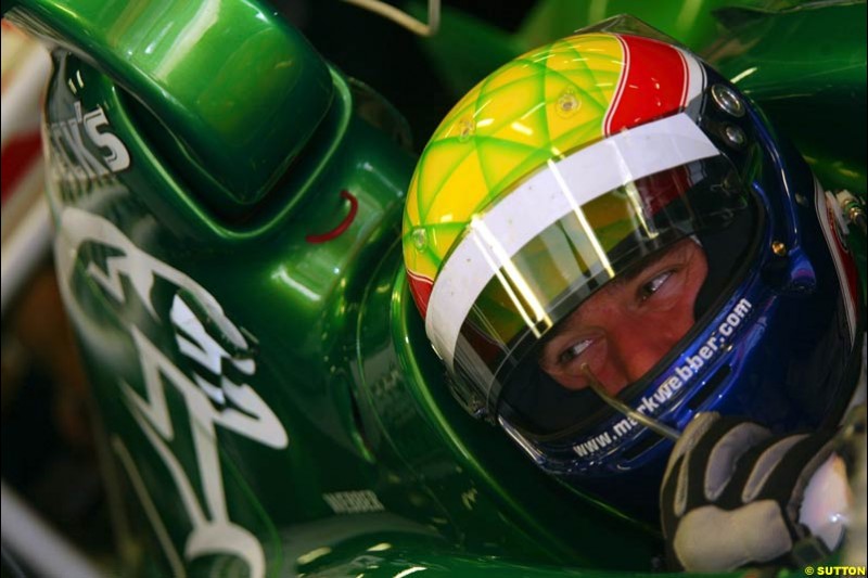Mark Webber (AUS) tests the Jaguar R3. Formula One Testing, Barcelona, Spain, 2June 8 2002.