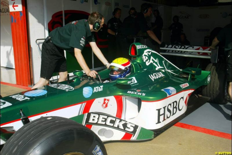 Mark Webber (AUS) tests the Jaguar R3. Formula One Testing, Barcelona, Spain, 2June 8 2002.