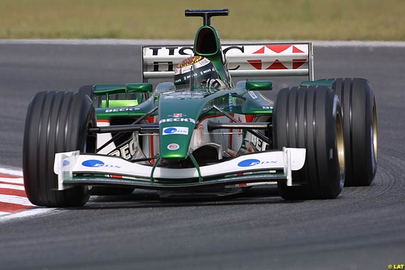 Eddie Irvine, Jaguar. Formula One Testing, Barcelona, Spain, 27 June 2002.