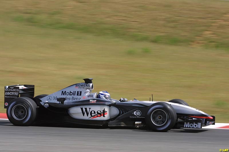 Kimi Raikkonen, McLaren. Formula One Testing, Barcelona, Spain, 27 June 2002.