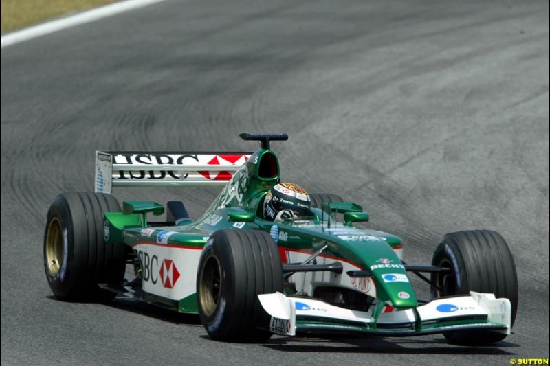Eddie Irvine (GBR) tests the revised Jaguar R3B. Formula One Testing, Barcelona, Spain, 27 June 2002.