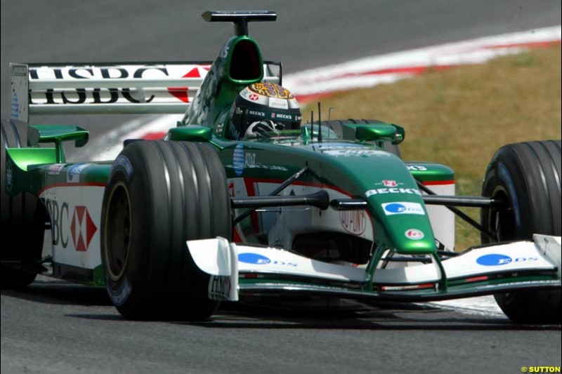 Eddie Irvine (GBR) tests the revised Jaguar R3B. Formula One Testing, Barcelona, Spain, 27 June 2002.