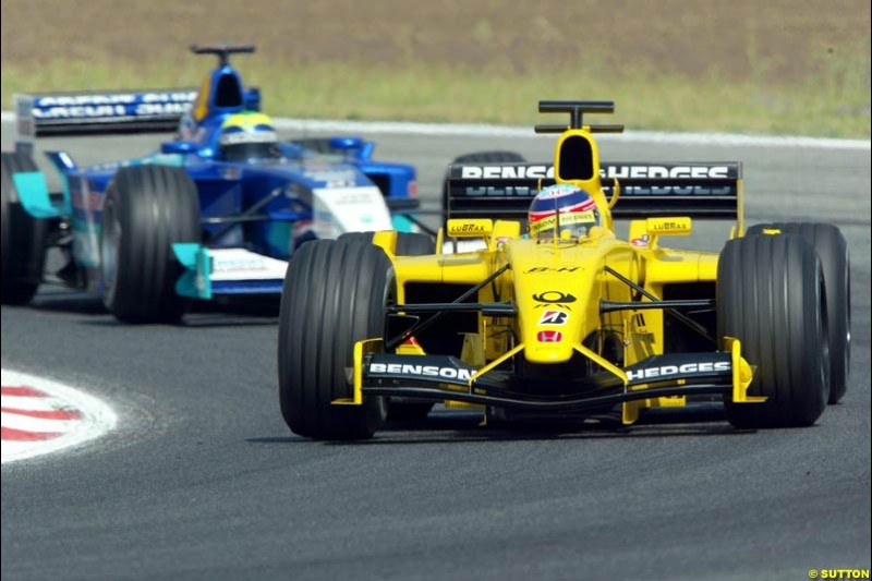 Takuma Sato, Jordan Honda EJ12, leads Felippe Massa, Sauber Petronas C22. Formula One Testing, Barcelona, Spain, 26 June 2002.