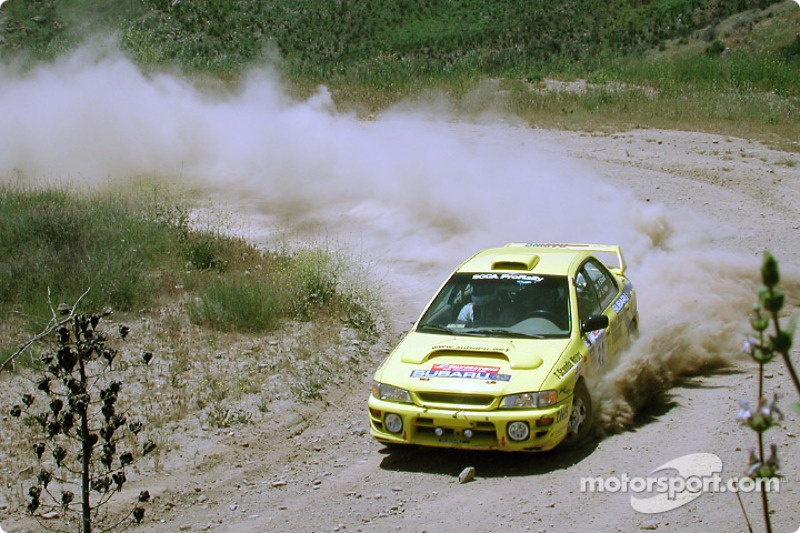 Paul Eklund and Scott Huhn in a Subaru Impreza