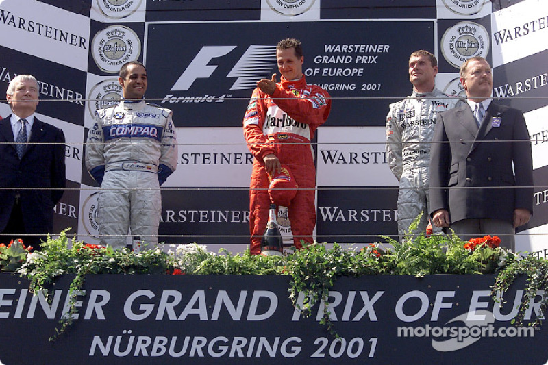 The podium: Juan Pablo Montoya, Michael Schumacher and David Coulthard