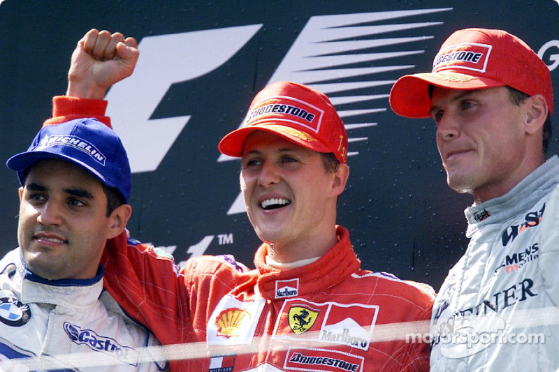 The podium: Juan Pablo Montoya, Michael Schumacher and David Coulthard