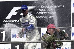 Podium: Ralf Schumacher, Williams, Jacques Villeneuve, BAR