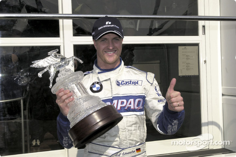 Ralf Schumacher ve his trophy