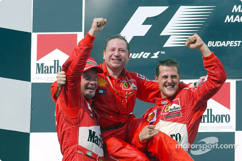 Michael Schumacher, Rubens Barrichello and Jean Todt celebrating