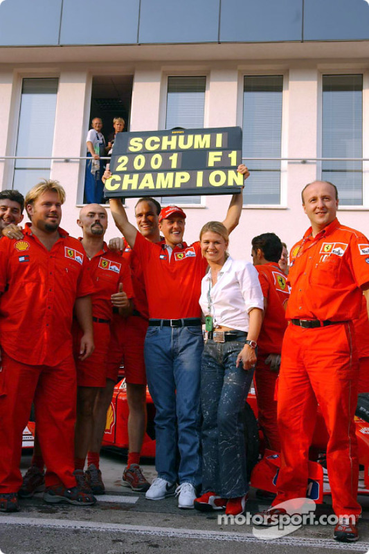 Michael Schumacher celebrating with his wife Corinna and Team Ferrari