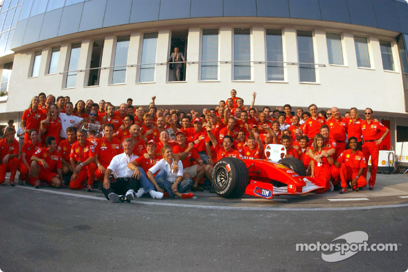 Michael Schumacher celebrating with Team Ferrari