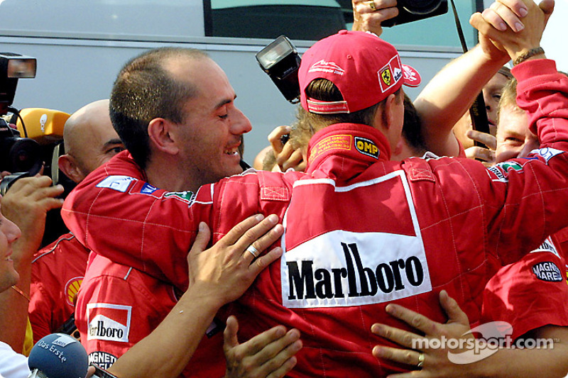 Michael Schumacher celebrating with Team Ferrari