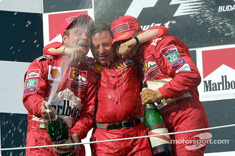 Rubens Barrichello, Jean Todt y Michael Schumacher celebrando