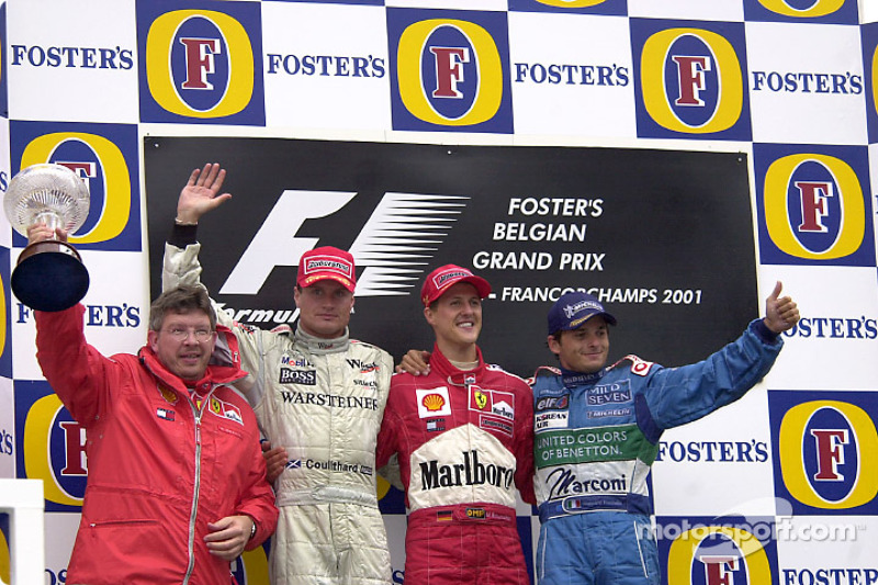 The podium: Ross Brawn, David Coulthard, Michael Schumacher and Giancarlo Fisichella