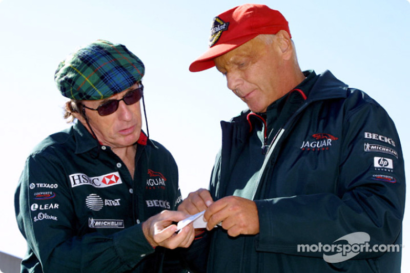 Jackie Stewart discussing with Niki Lauda