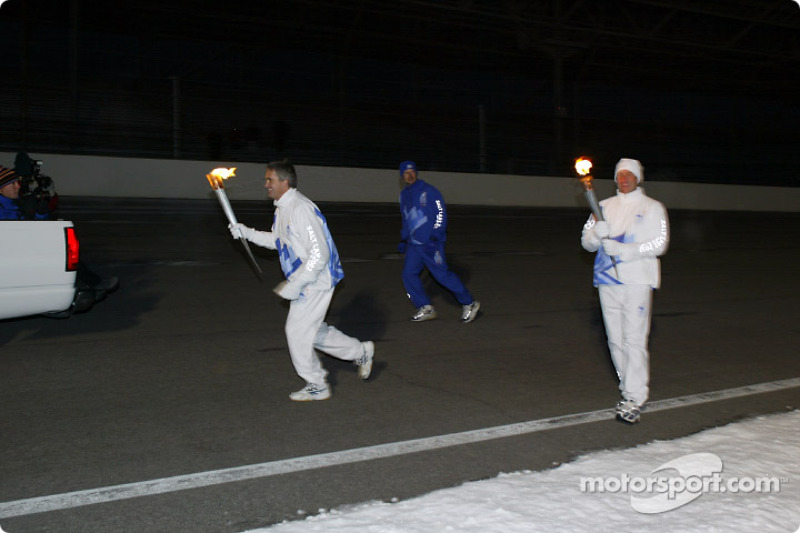 Eddie Cheever begins his leg of the Olympic Torch journey