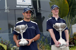 Juan Pablo Montoya and Ralf Schumacher with their trophies