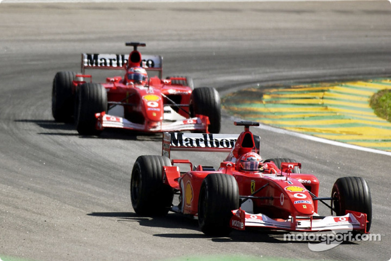 Rubens Barrichello about to pass Michael Schumacher