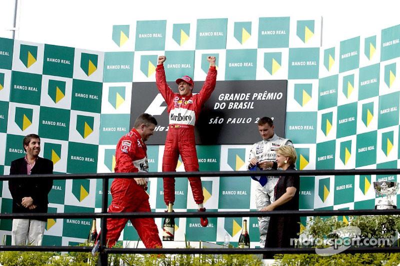 2002. Інтерлагос. Подіум: 1. Міхаель Шумахер, Ferrari. 2. Ральф Шумахер, Williams BMW. 3. Девід Култхард, McLaren Mercedes