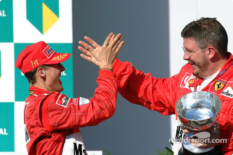 Race winner Michael Schumacher and Ross Brawn