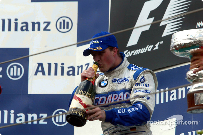 El podio: champaña para Ralf Schumacher