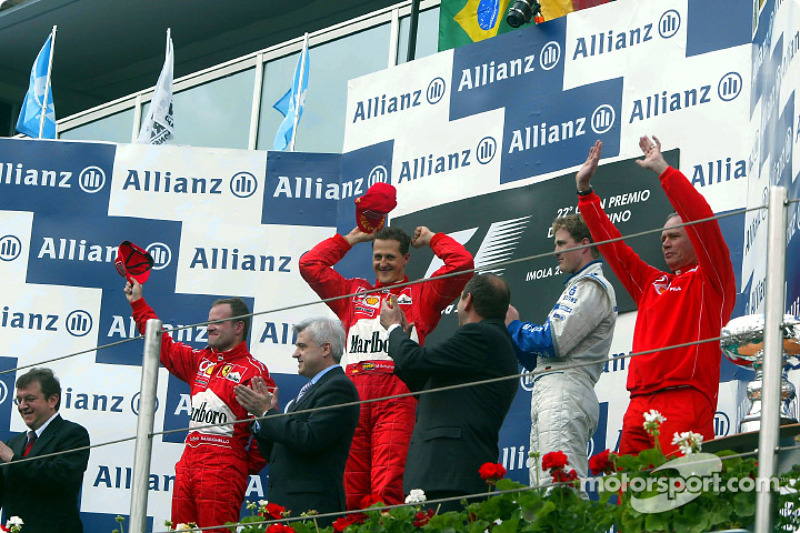 The podium: race winner Michael Schumacher with Rubens Barrichello and Ralf Schumacher