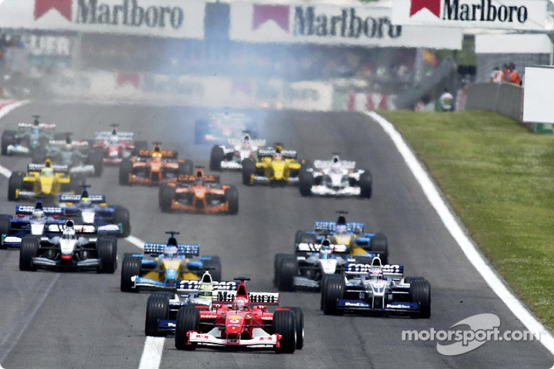 start: Michael Schumacher taking lead front, Ralf Schumacher