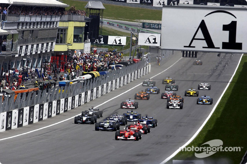 The start: Rubens Barrichello taking the lead in front of Michael Schumacher and Ralf Schumacher