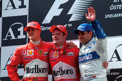 The podium: Michael Schumacher, Rubens Barrichello and Juan Pablo Montoya