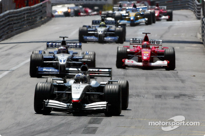 First lap: David Coulthard leading Juan Pablo Montoya and Michael Schumacher