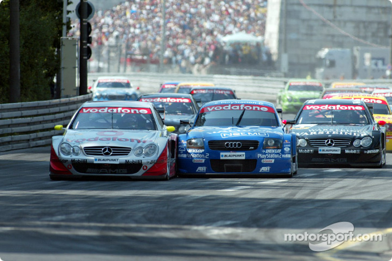 The start: Bernd Schneider and Mattias EkstrÃ¶m fighting for the lead