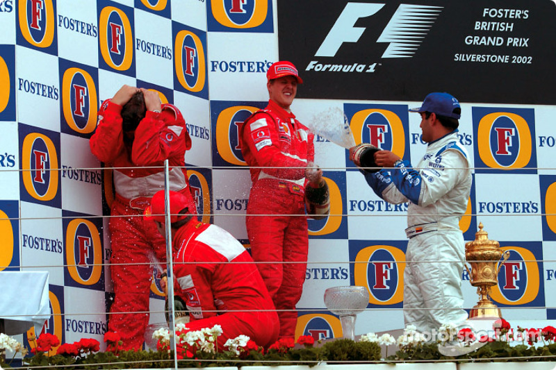 The podium: race winner Michael Schumacher with Rubens Barrichello and Juan Pablo Montoya