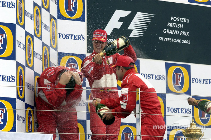 Champagne for Michael Schumacher, Rubens Barrichello and Ross Brawn