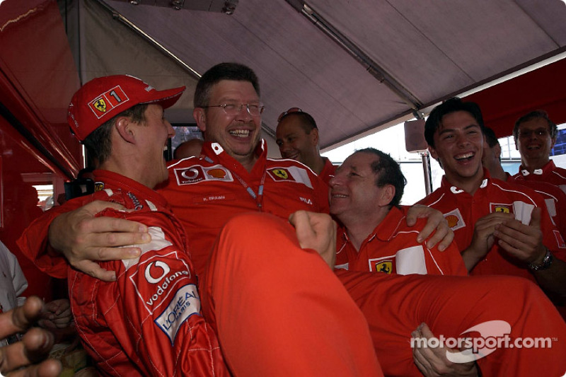 Michael Schumacher, Ross Brawn and Jean Todt celebrating