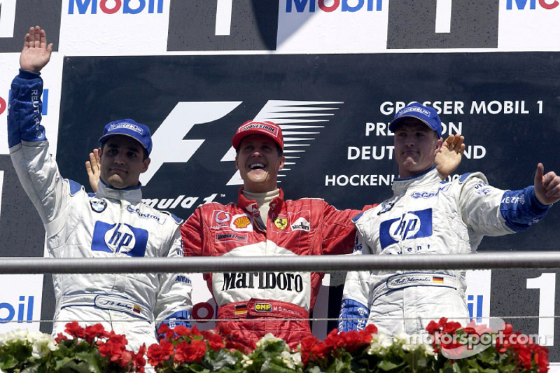 El podio: el ganador de la carrera, Michael Schumacher con Juan Pablo Montoya y Ralf Schumacher