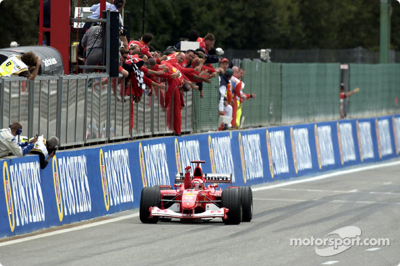 Michael Schumacher taking checkered flag