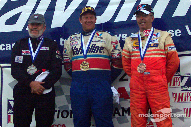 The podium: race winner Brad Stout with Gary Kittell and Andres Serrano
