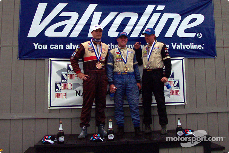 The podium: race winner Andrew Prendeville with Doug Prendeville and Brian Tomasi