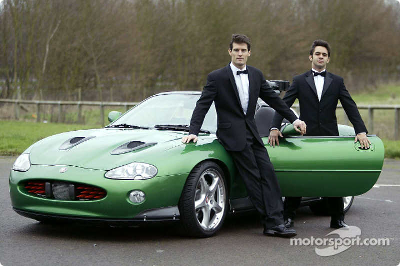 Mark Webber and Antonio Pizzonia pose with the James Bond 007 XK-R during a photoshoot at the Jaguar