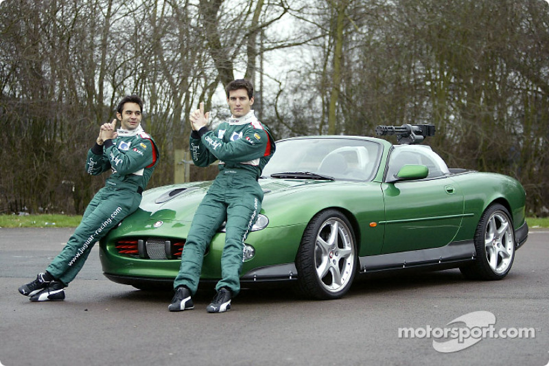 Mark Webber and Antonio Pizzonia pose with the James Bond 007 XK-R during a photoshoot at the Jaguar