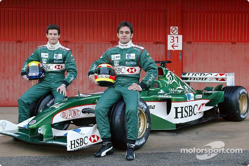 Mark Webber and Antonio Pizzonia pose with the new Jaguar R4