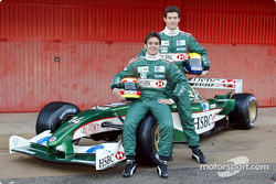 Mark Webber and Antonio Pizzonia pose with the new Jaguar R4