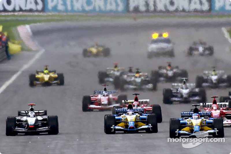 The start: Fernando Alonso leads the field